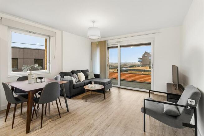Experience modern elegance in a welcoming living space with expansive views.