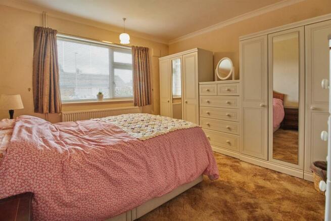 BEDROOM ONE TO FRONT