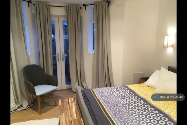 Master Bedroom With Full Length Bay Windows