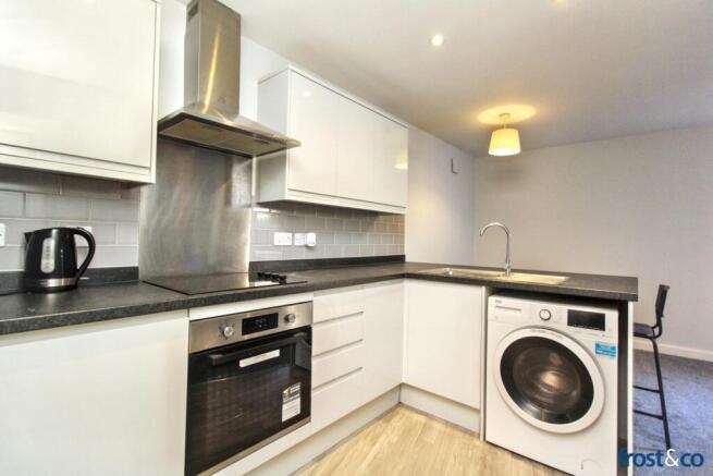 Kitchen to Lounge.