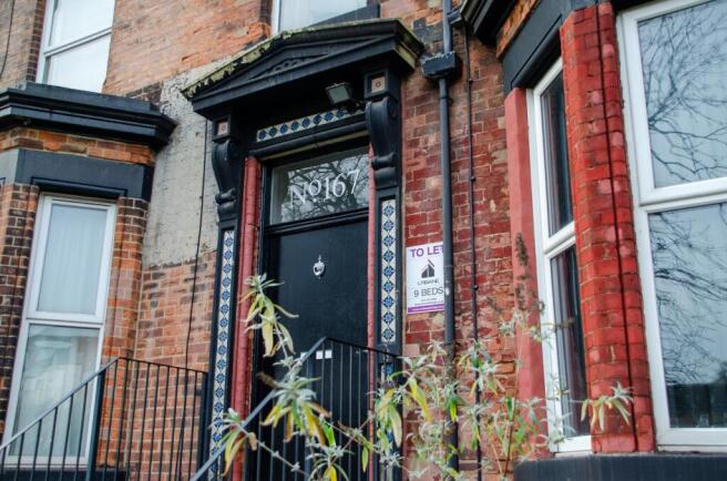 Charming period entrance with character feature...