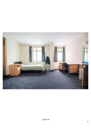 Bright and spacious room with dual study areas...