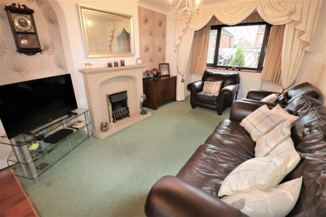 THROUGH LIVING AND DINING ROOM