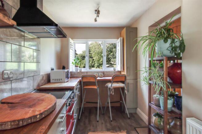 Kitchen to Breakfast Bar.jpg