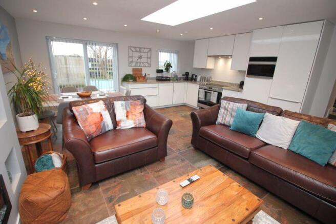 Open plan lounge dining room and kitchen