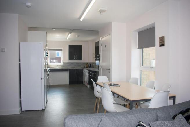 Bright open-plan kitchen and dining area...