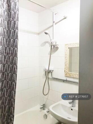 Bath Room With Bath And Shower