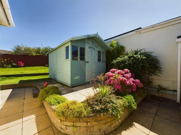 Shed rear of Garage.