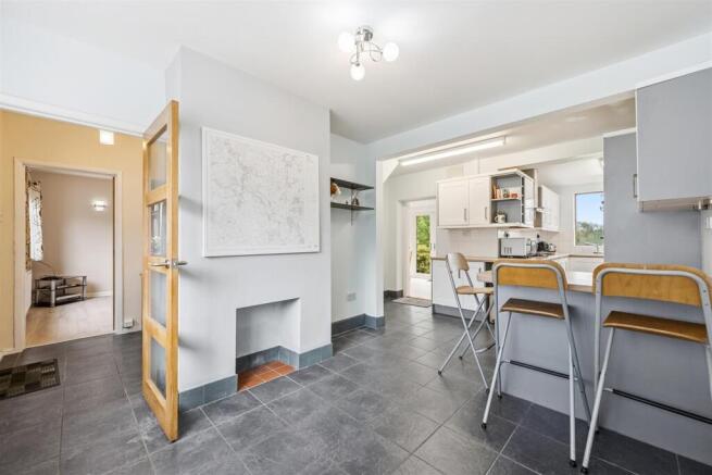 Kitchen to Sitting Room and Sun Room.jpg