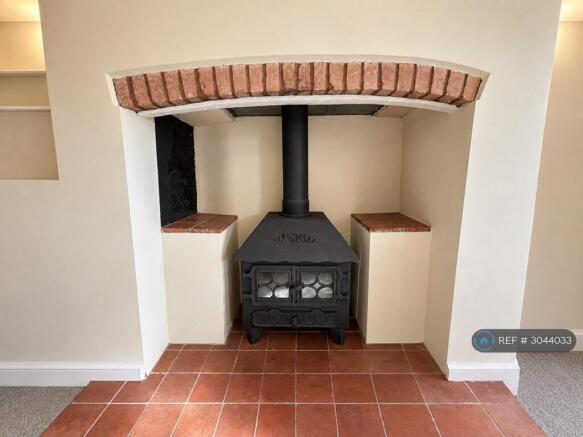 The Woodburning Stove In The Sitting Room