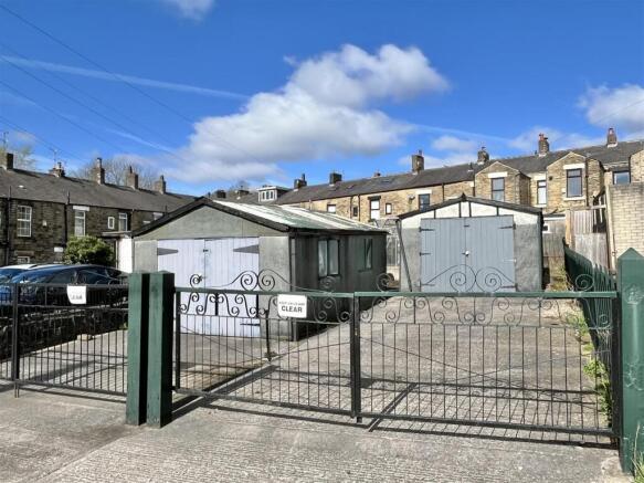 Two Detached Garages & Gated Parking