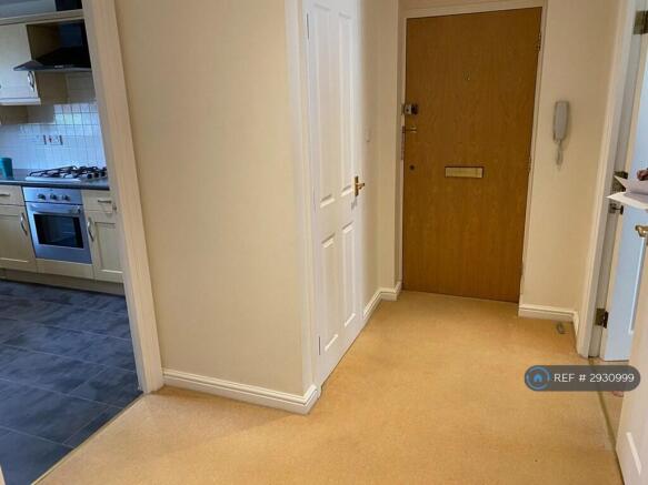 Hallway With Full Height Storage Cupboard