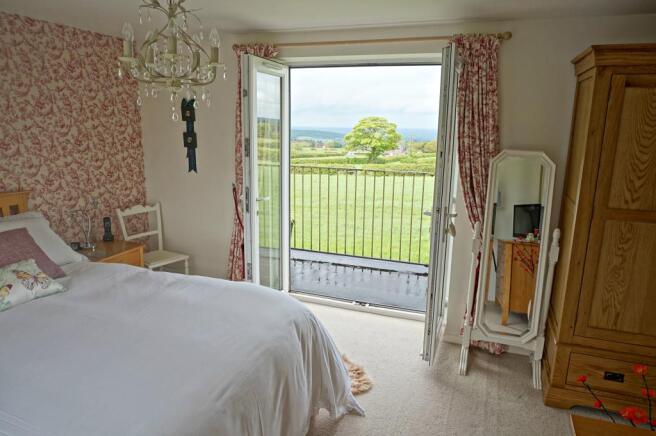 Master Bedroom with Balcony