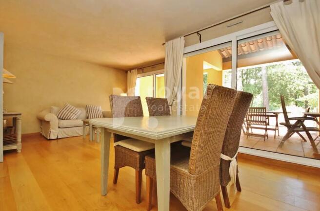 Inviting dining area in a luxurious setting - Roya