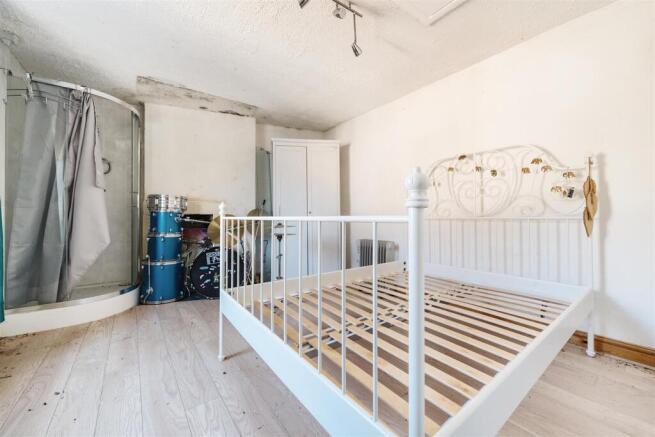 OUTBUILDING FIRST FLOOR BEDROOM