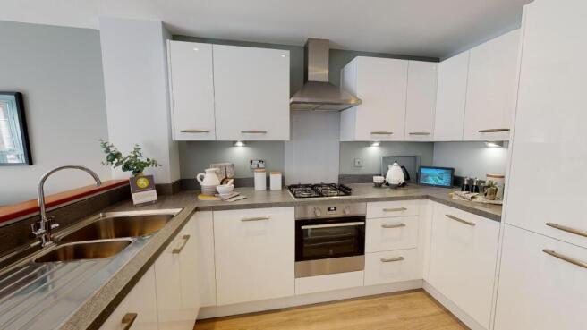 U-shaped kitchen with white units