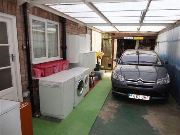 ENCLOSED CARPORT