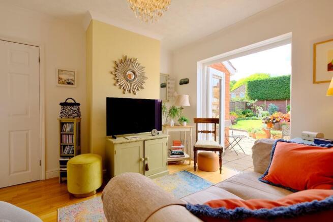 TV / family room, doors to the garden