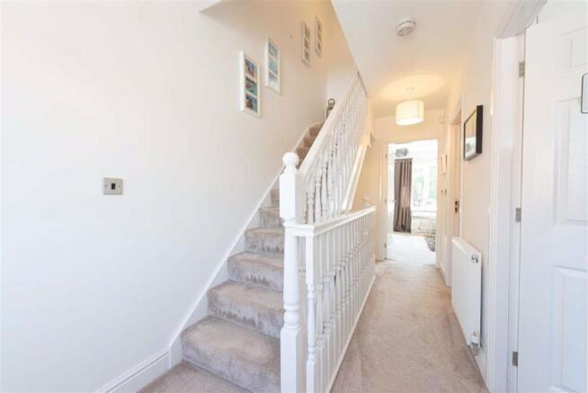 STAIRS LEAD FROM RECEPTION HALL TO FIRST FLOOR