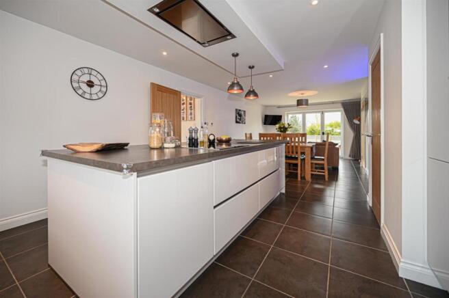 Living kitchen with bifolding doors into gardens
