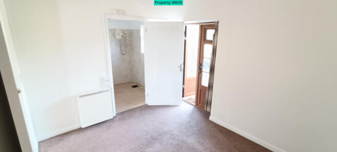 Bedroom, view of Bathroom & Garden Patio doors