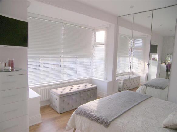 FRONT BEDROOM ONE