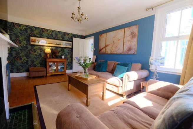 Sitting room with open fire place