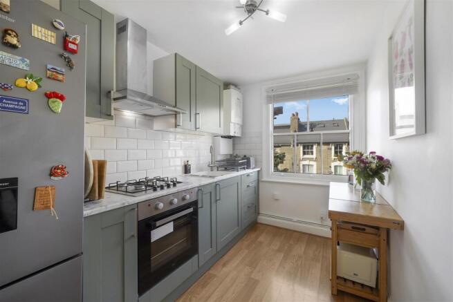 Newly fitted kitchen with marble worktops