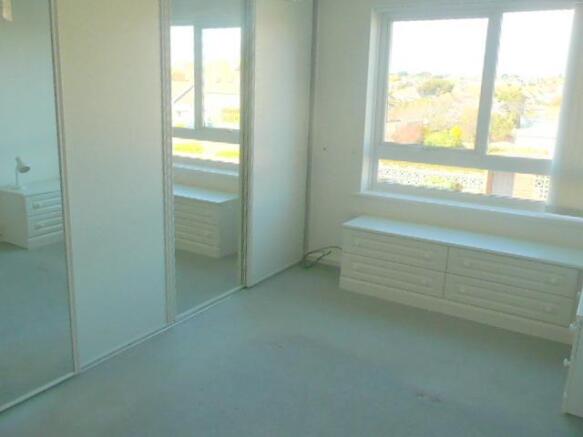 Bedroom with mirror wardrobes