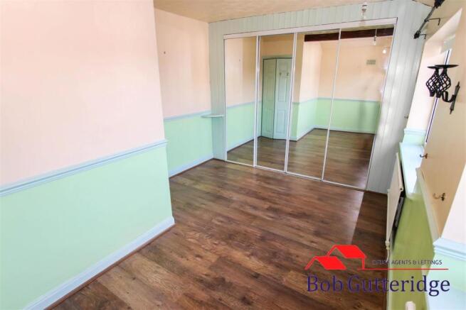 BEDROOM ONE (FORMELY TWO BEDROOMS)