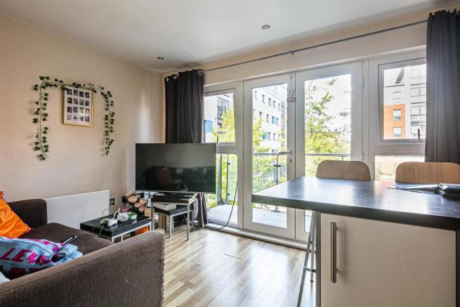 Bright lounge with a private balcony view...
