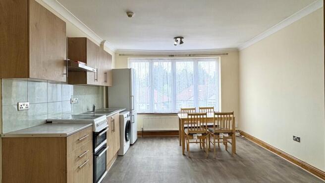 Bright kitchen with spacious dining area...