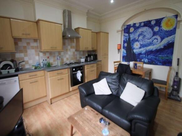 Bright and welcoming kitchen with modern applia...