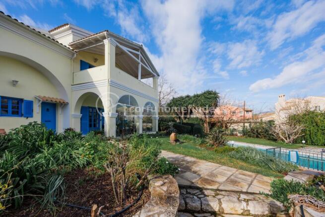 Front of house with pool