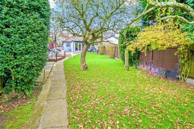 To the rear of the house