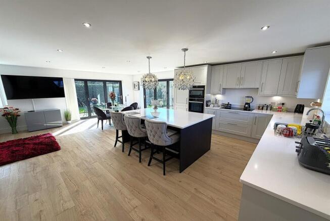 Modern open-plan kitchen with a large island...