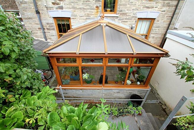 Rear Conservator with surrounding pathway