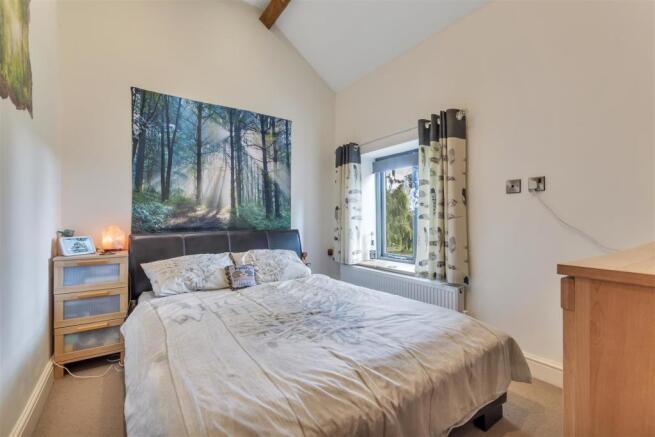 FIRST BEDROOM