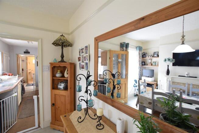 Dining area leading to kitchen