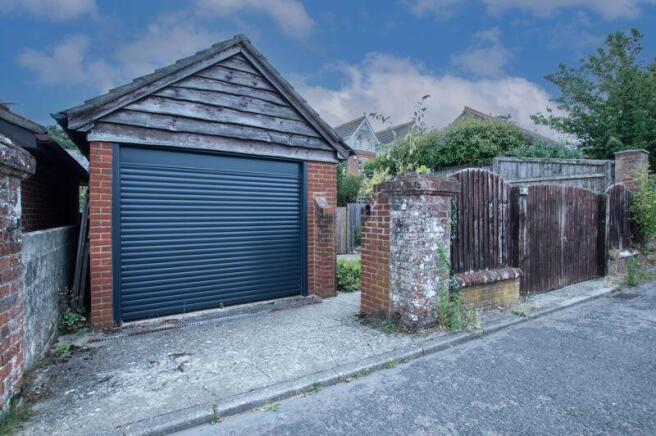 Garage and parking accessed from Vict...