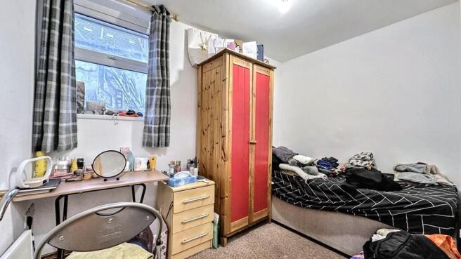 Cozy bedroom with ample storage and study desk...
