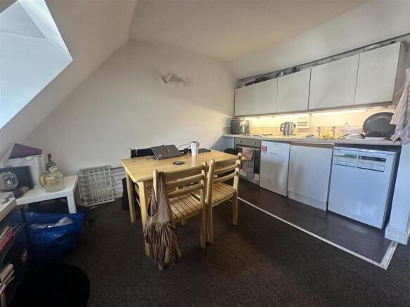 Bright kitchen with integrated appliances...