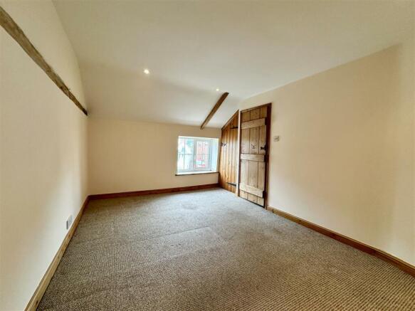 bedroom two with built in wardrobe.JPEG