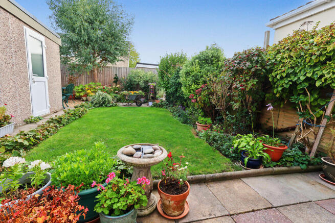 Garden & door to garage
