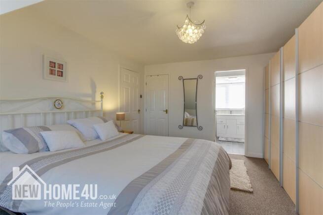 MASTER BEDROOM: