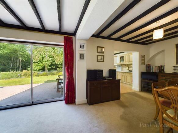 Dining room leading to kitchen