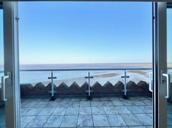View through sliding doors to front b...