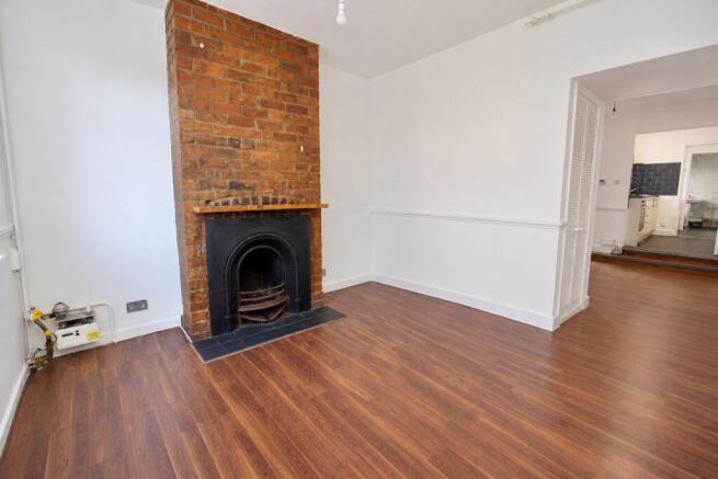 Minimalist Brick Fireplace Living Room.jpeg