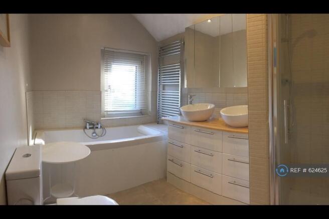Family Bathroom And Built In Shower Cubicle