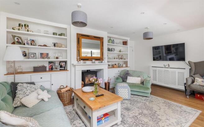 Log burner in open plan sitting room